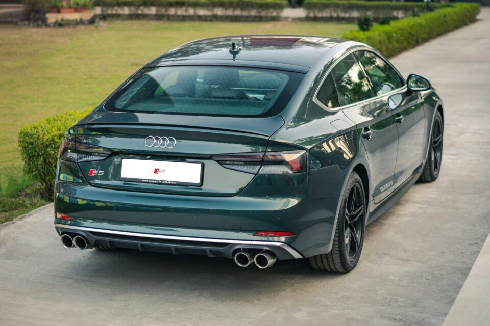 High-angle view of a parked Audi car showcasing sleek design and back view aesthetics.